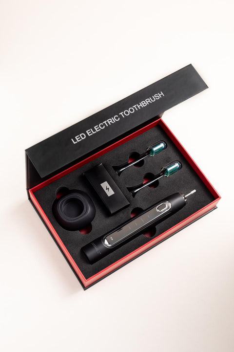 La Première Brosse à Dents électrique intelligente avec Technologie LED Blanchissante Intégrée"